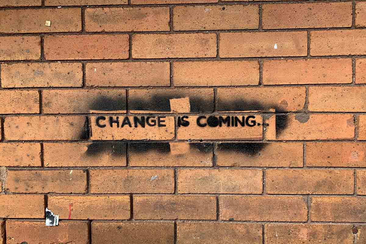 stencil that reads "Change is coming" from the wall of Cup Foods, photographed on October 16, 2020