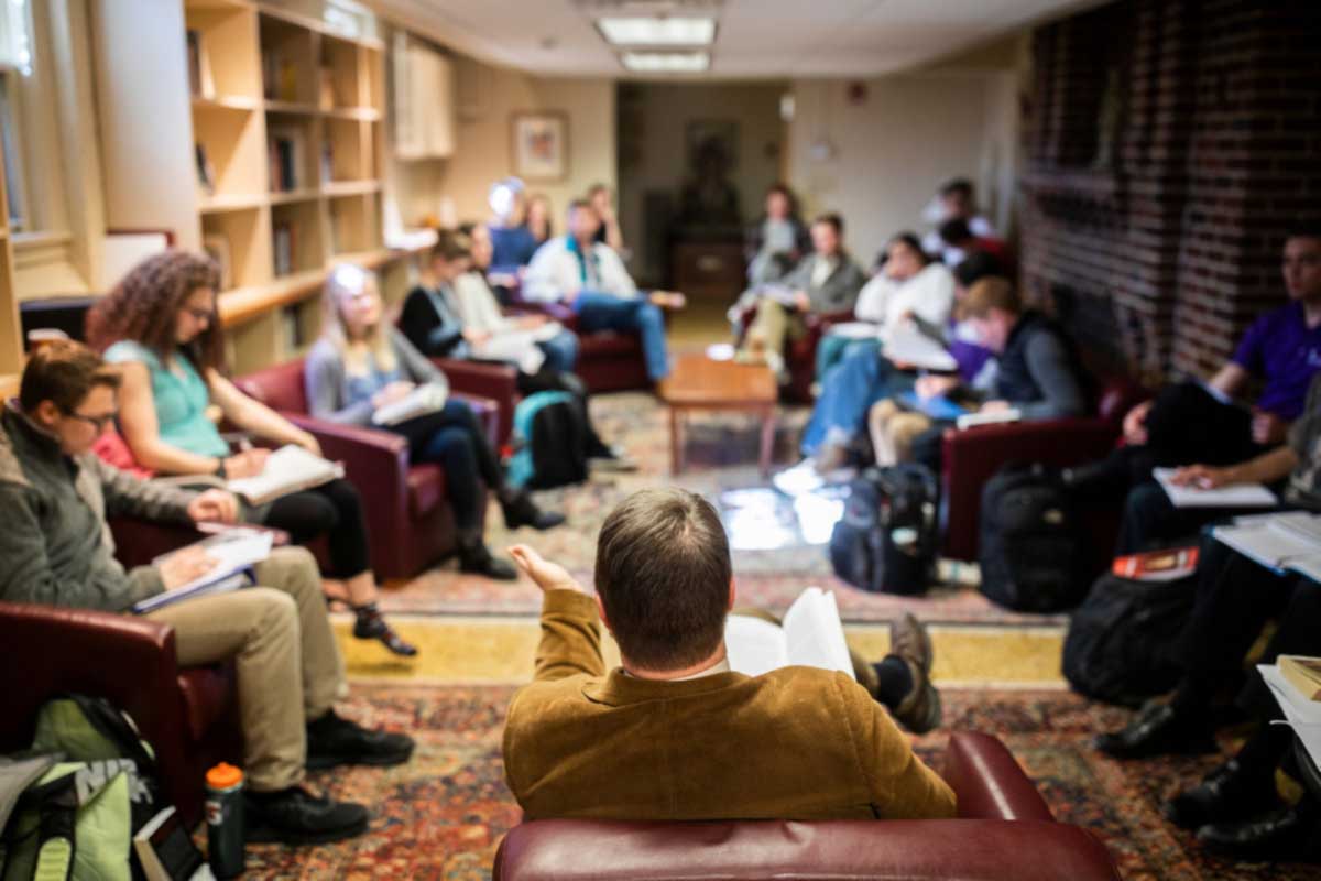 Catholic Studies discussion in Sitzmann Hall library.
