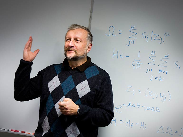 Professor Arkady Shemyakin speaks during presentations in one of his statistics courses.