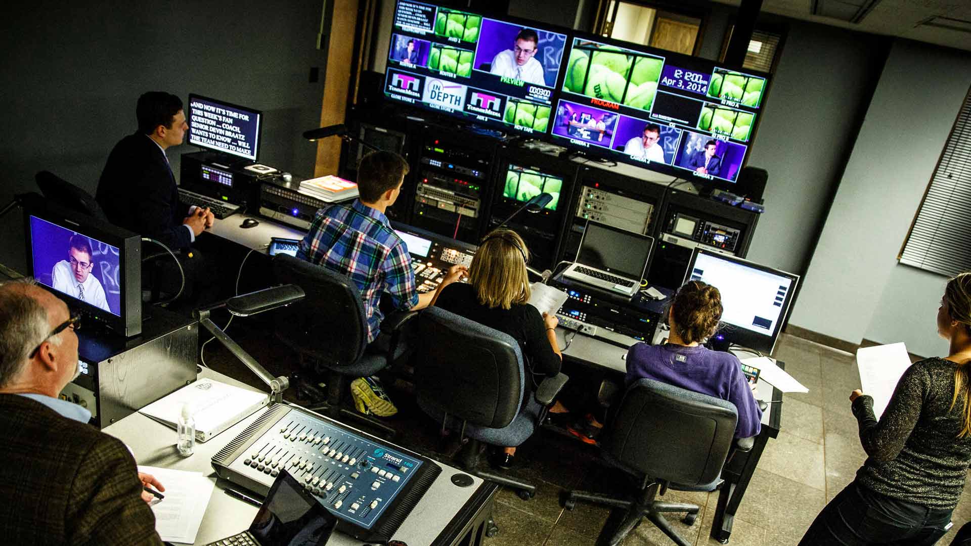 Students work in the control room during production of the TommieMedia program "The Locker Room" in the TV studio in O'Shaughnessy Educational Center.