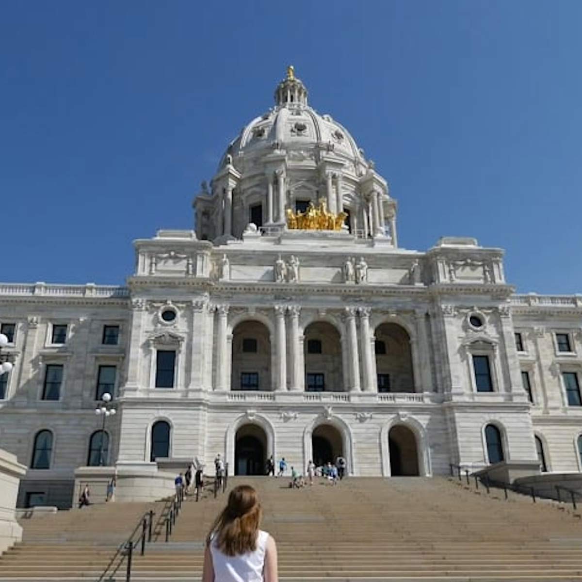 A student approaches the Minnesota State Capitol. 