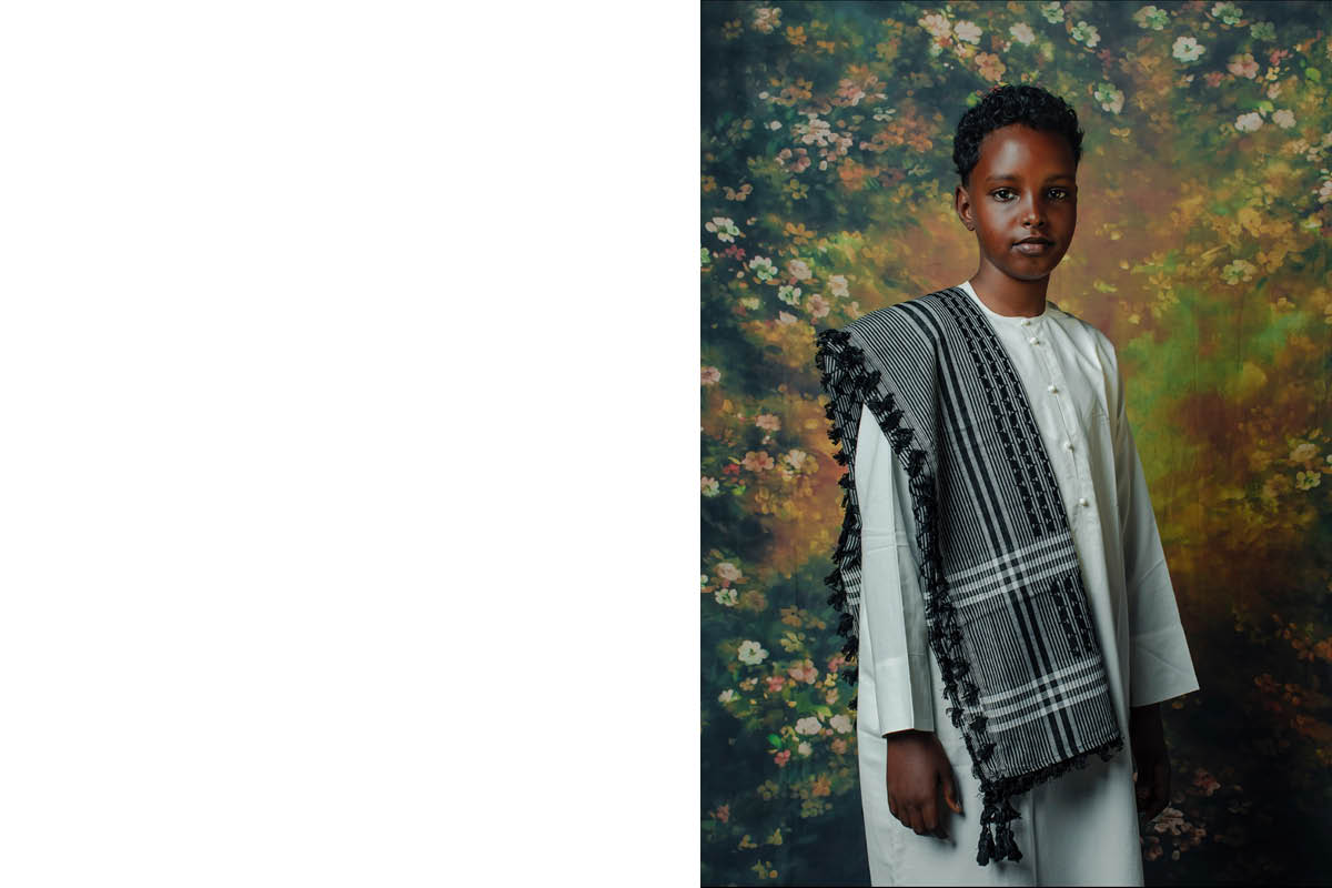 image of young black boy wearing traditional Muslim garments