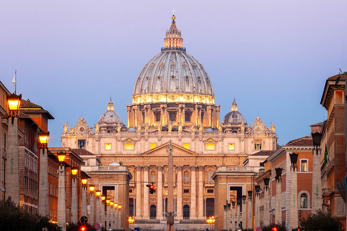 St. Peter's Basilica in Rome, Italy at sunset.