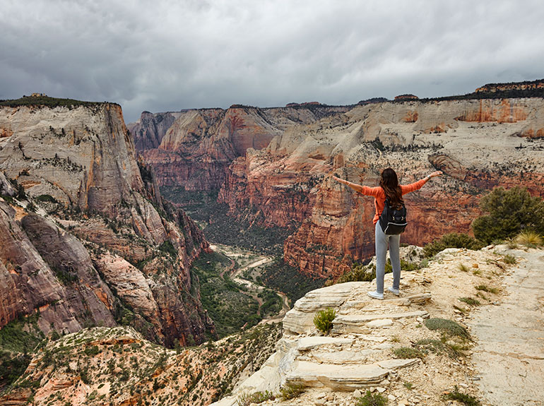 A student looking into the horizon at the Zion National Park.