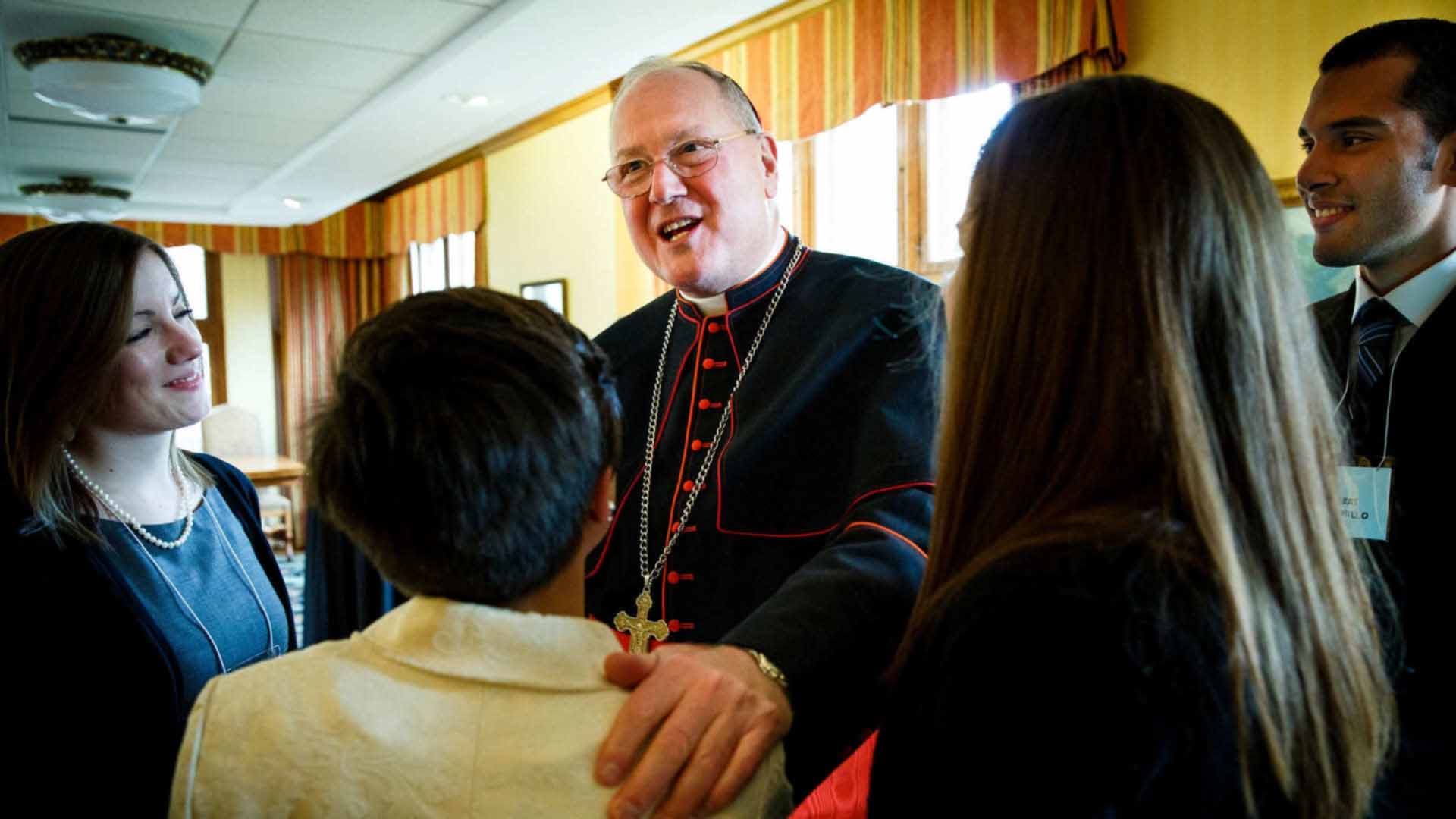 Photo of Archdiocese of New York Cardinal Dolan with college student leaders at St. Thomas Catholic Studies 20th Anniversary. 