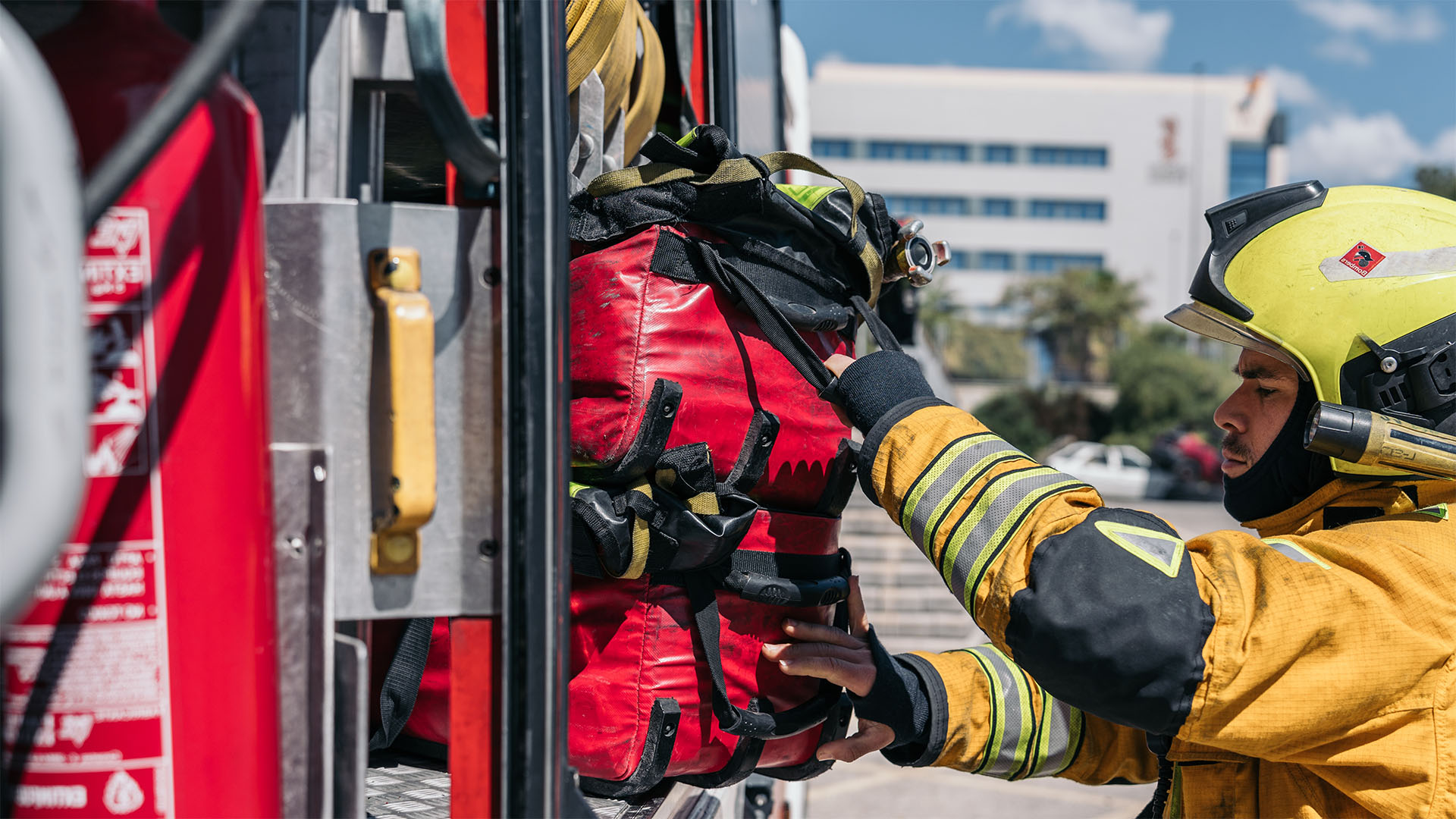 A firefighter prepares to respond to an emergency