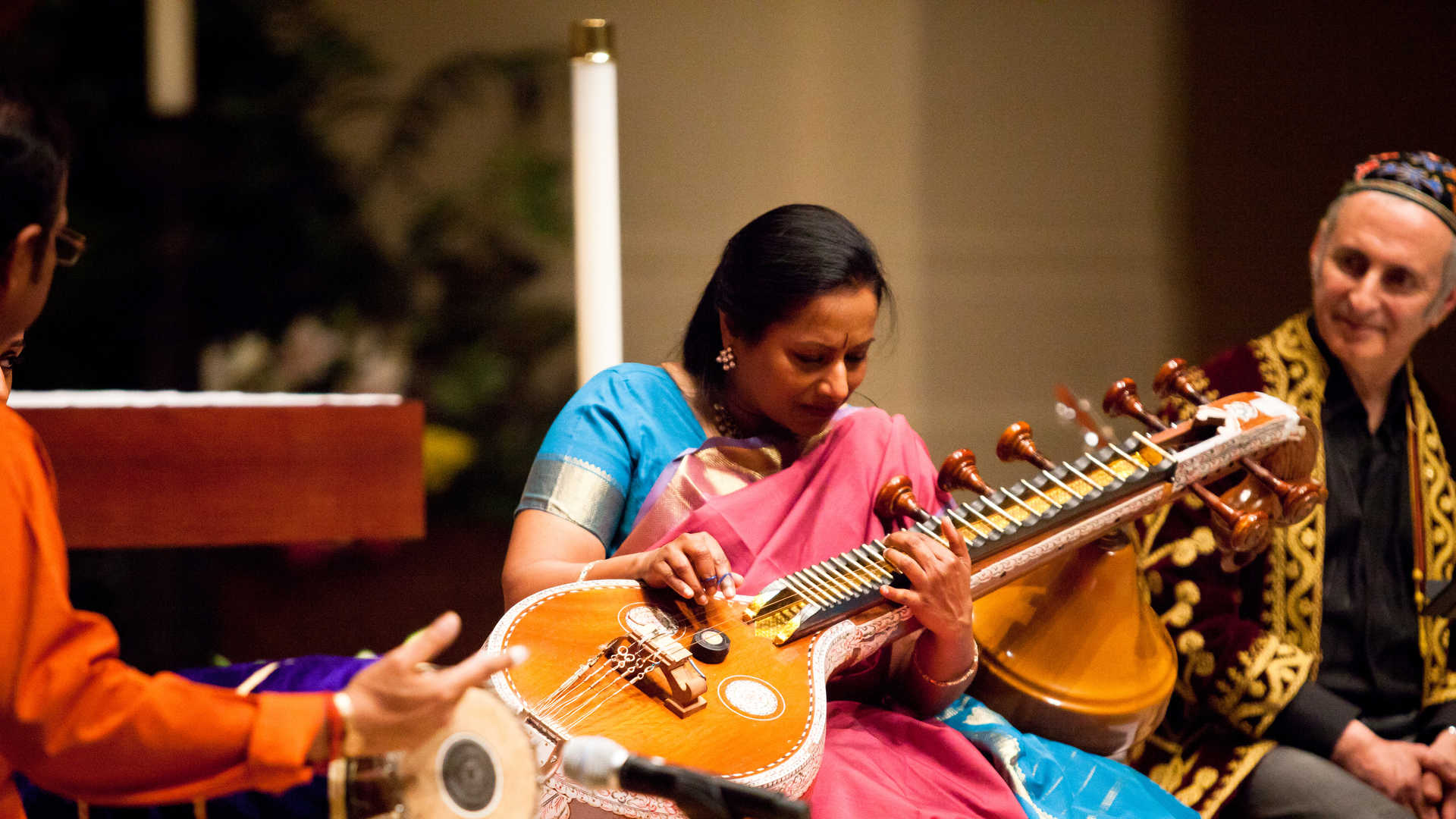 A Hindu musician plays an instrument during a concert on the St. Thomas campus.