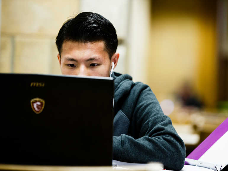 A student working on a computer