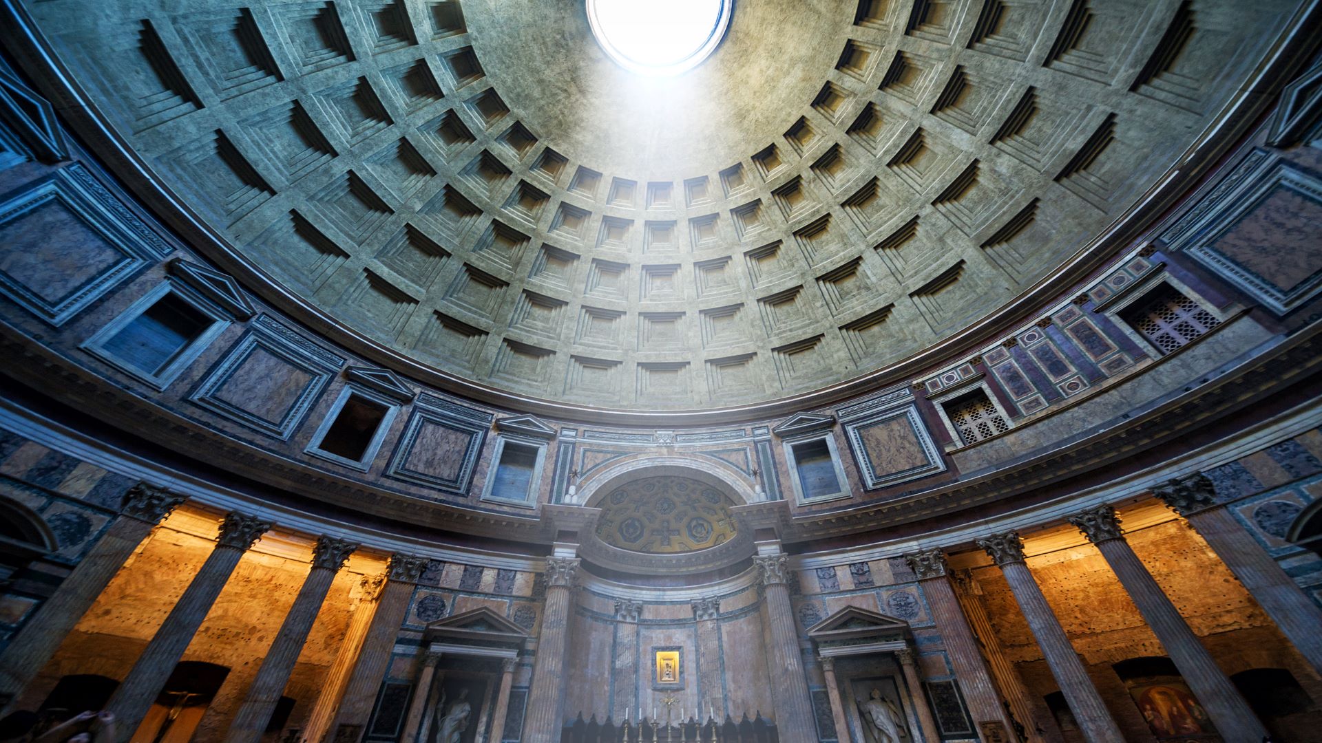 View of a domed ceiling with a ray of sunlight.