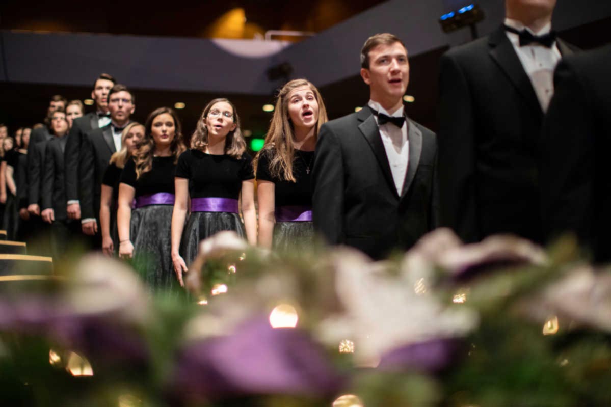 The Concert Choir enters Orchestra Hall during Christmas Concert rehearsal. 