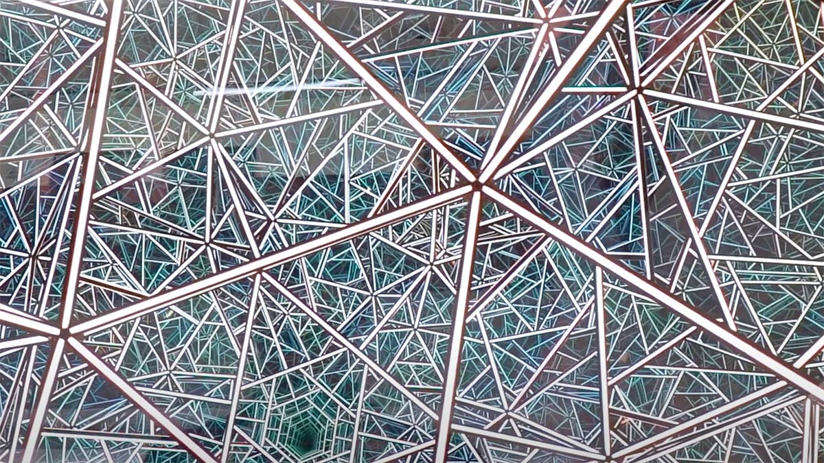 Detail of the Portal Icosahedron statue featuring glass and light